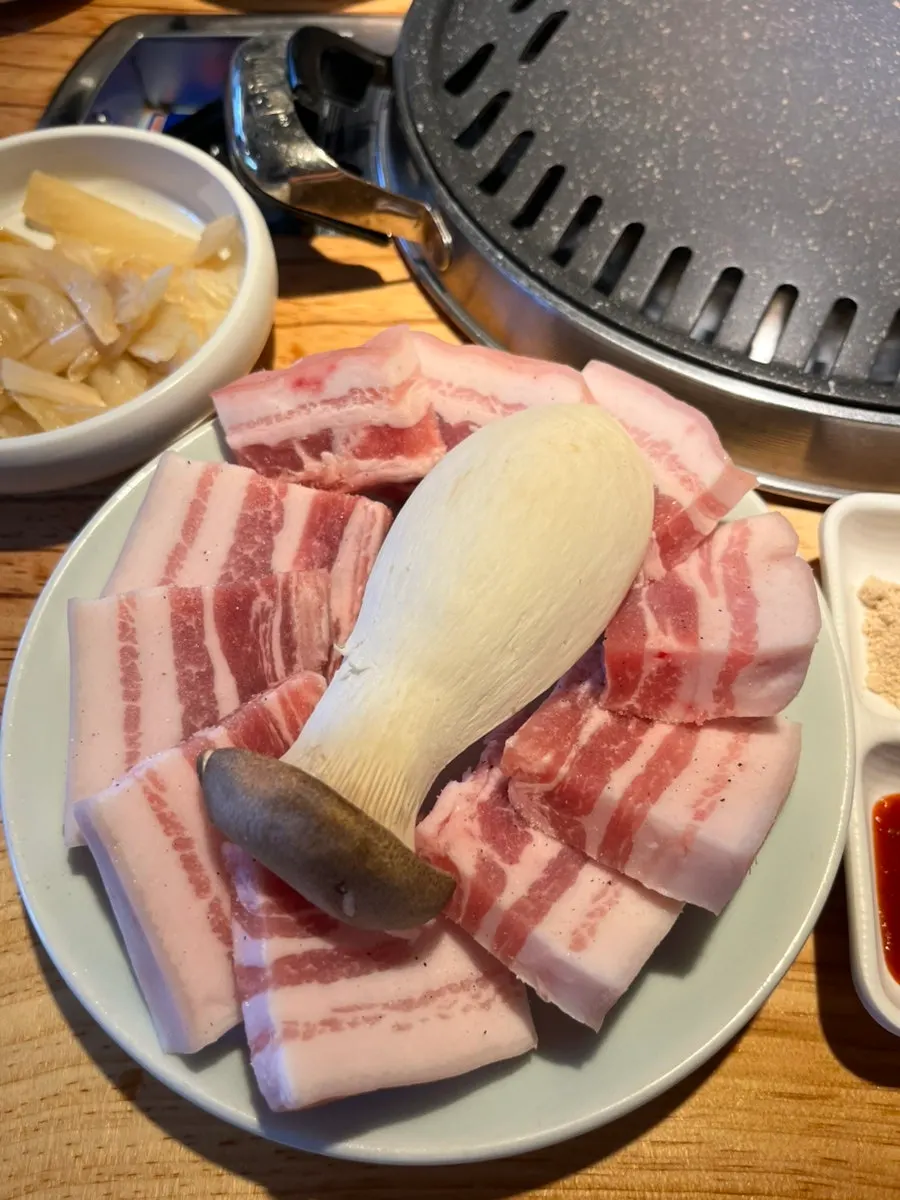 Plate of 3 servings of raw ogyeopsal ordered