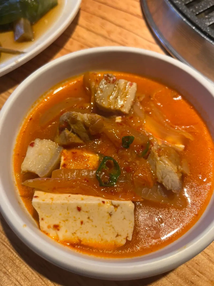 Whole pork kimchi jjigae with chunks of pork