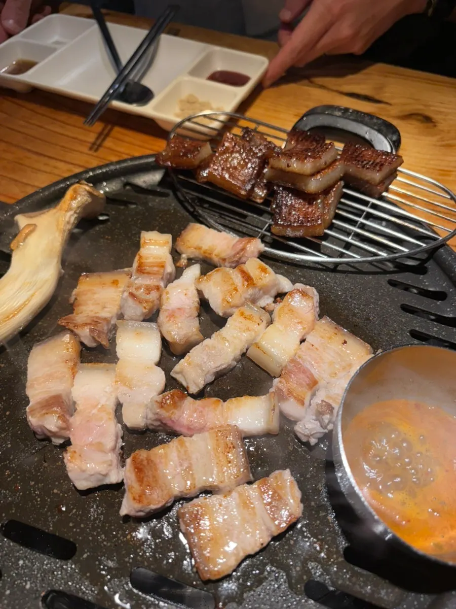 Extra serving of ogyeopsal with wild garlic and mentaiko combo at Chopilsal Pork Grill near Hongdae Station