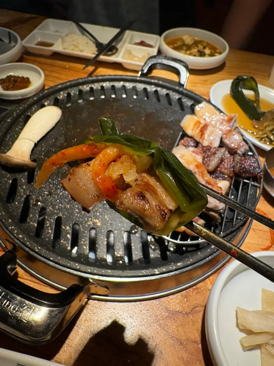 Ogyeopsal wrapped in wild garlic leaves