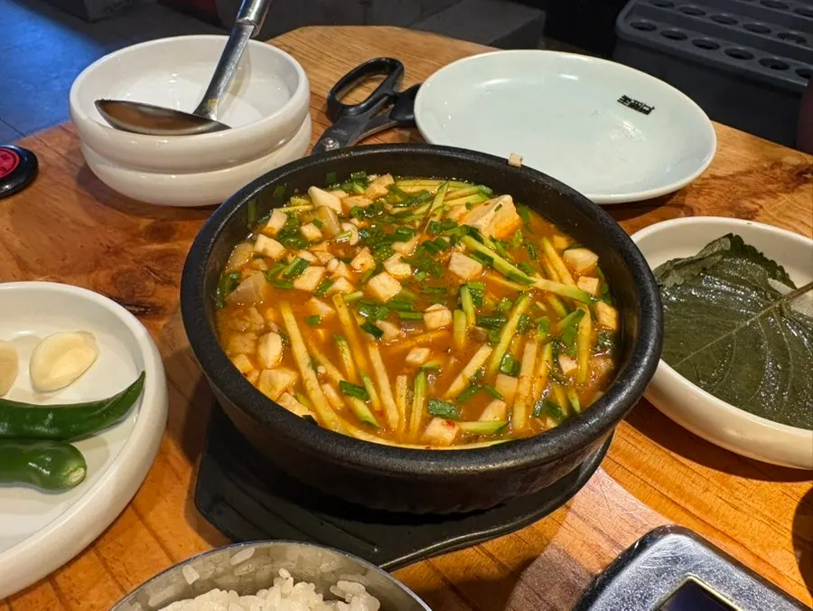 Zucchini doenjang jjigae served with rice