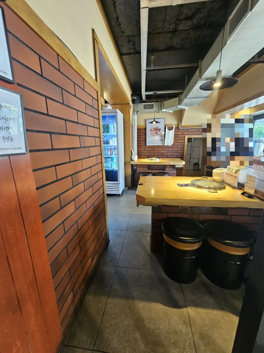 2nd floor seating with window-side tables