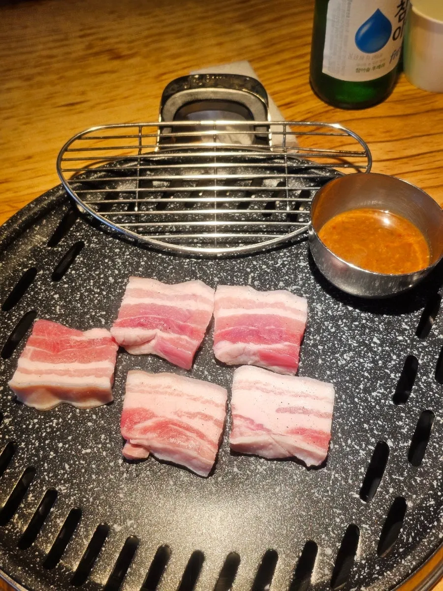 Three servings of pre-cut salted pork belly
