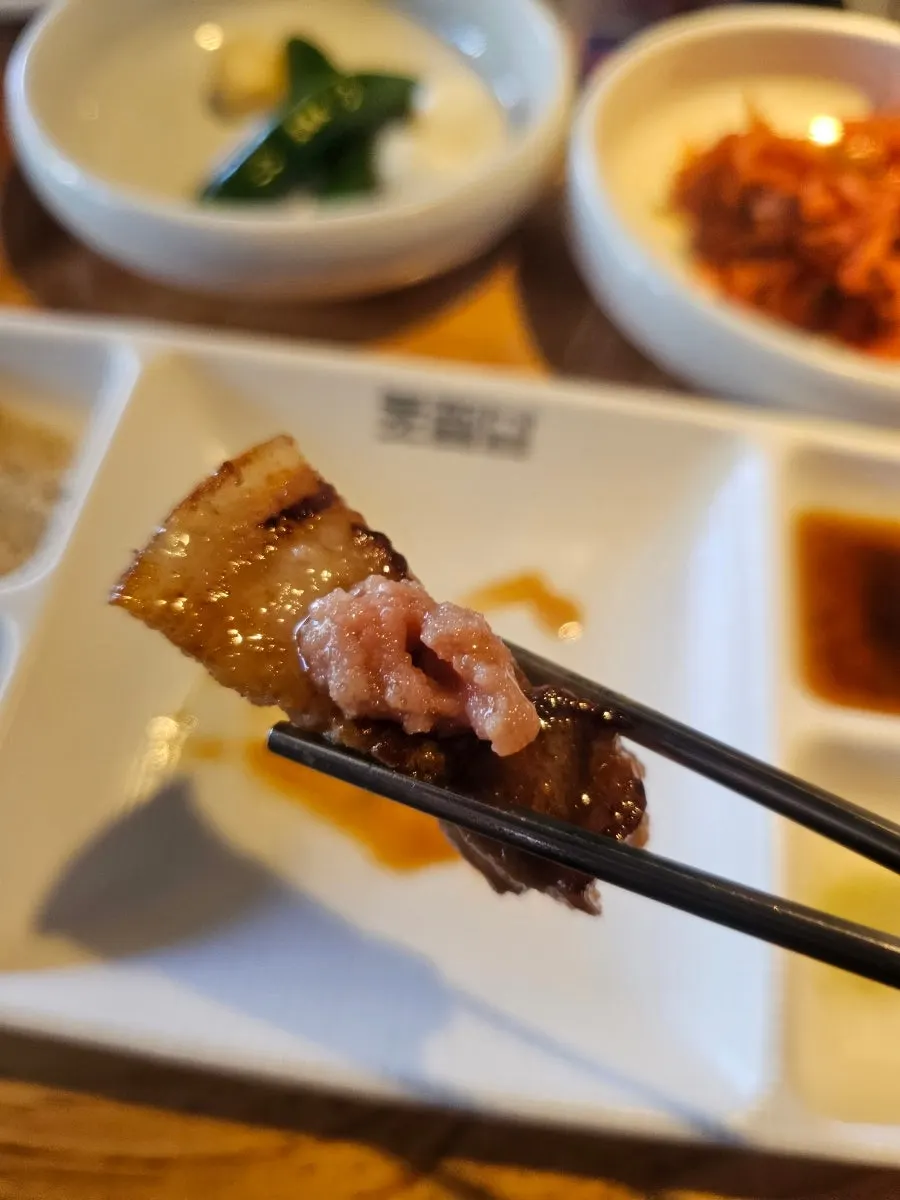 A piece of pork belly topped with pollack roe