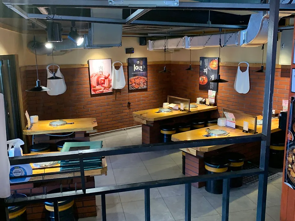 Retro-style seating inside the Hongdae BBQ restaurant