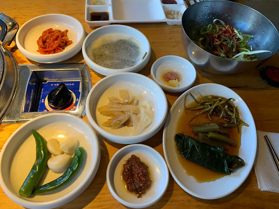 Side dish spread with myeongi namul, pajeori, myeongnan-jeot and mel-jeot