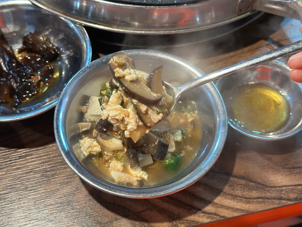 Doenjang jjigae served together with a bowl of rice