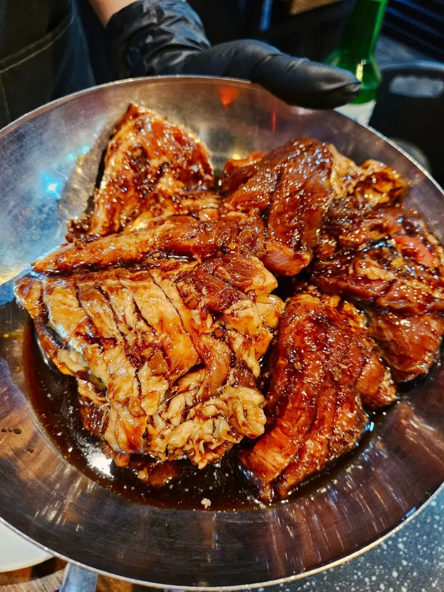 Seated at the table before ordering at Choryang Hyeongje Galbi