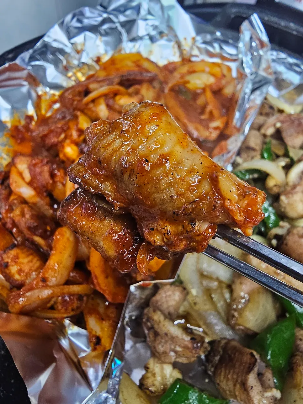Kkomjangeo wrapped in a perilla leaf