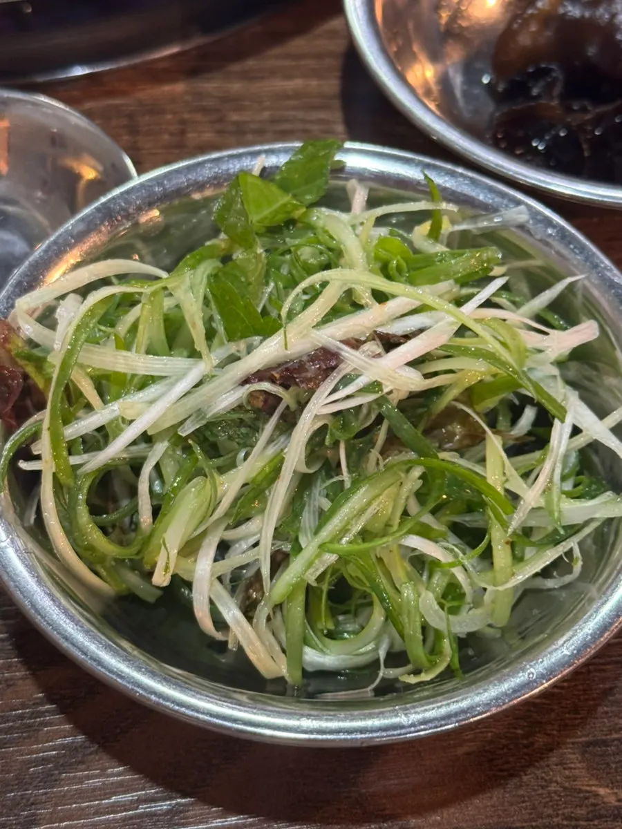 Scallion kimchi and pickled angelica root among the side dishes