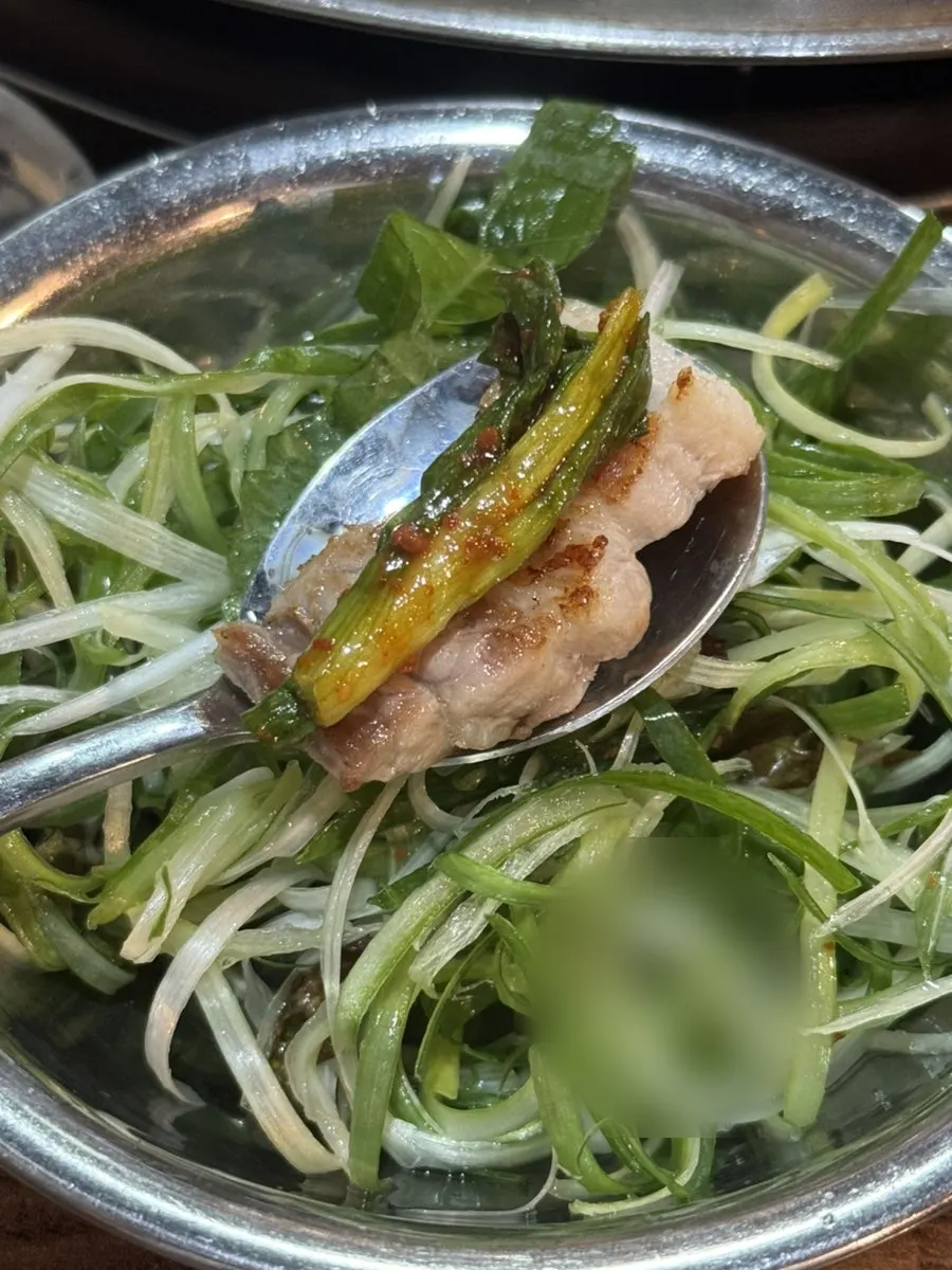 A plain piece of fresh pork rib with no toppings