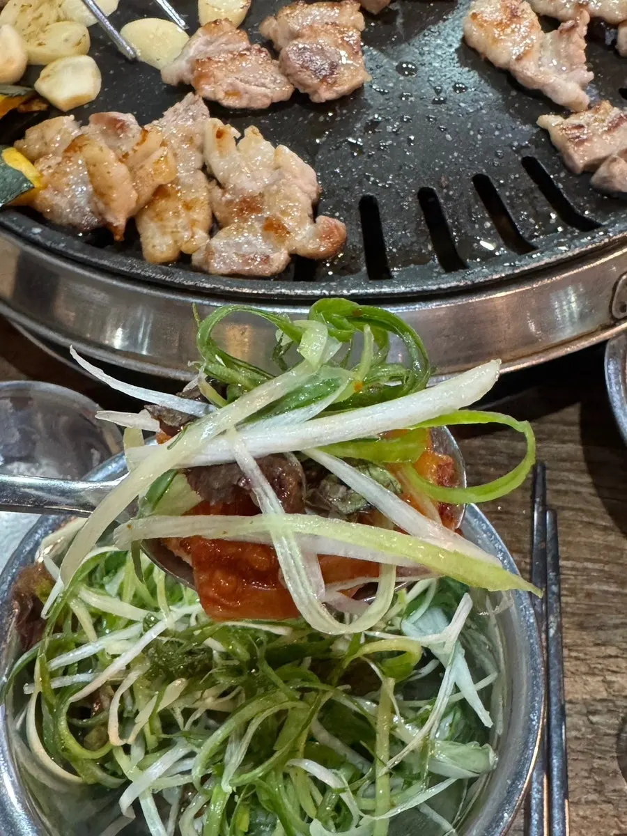 Fresh pork rib topped with chive kimchi
