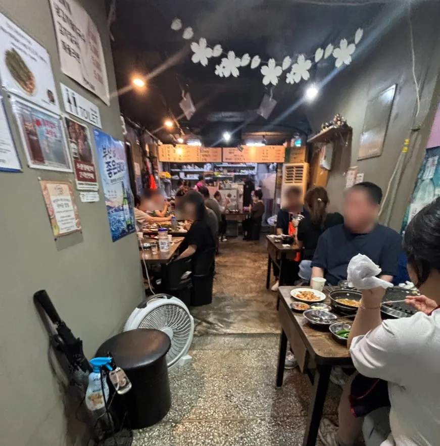 Interior of Choryang Hyeongje Galbi packed with customers