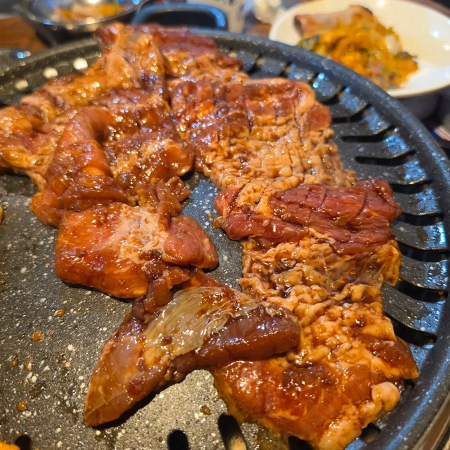 Marinated ribs filling the grill
