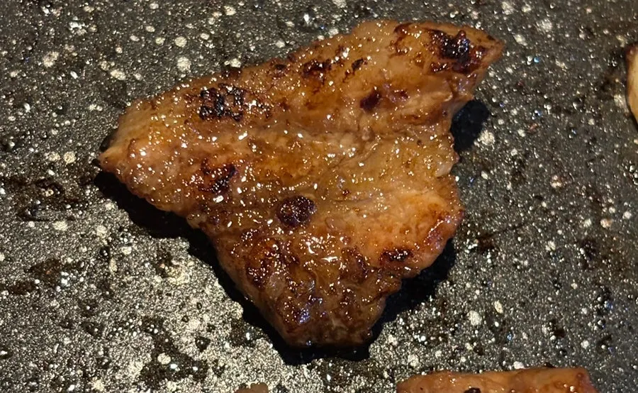 Close-up of golden-grilled marinated ribs