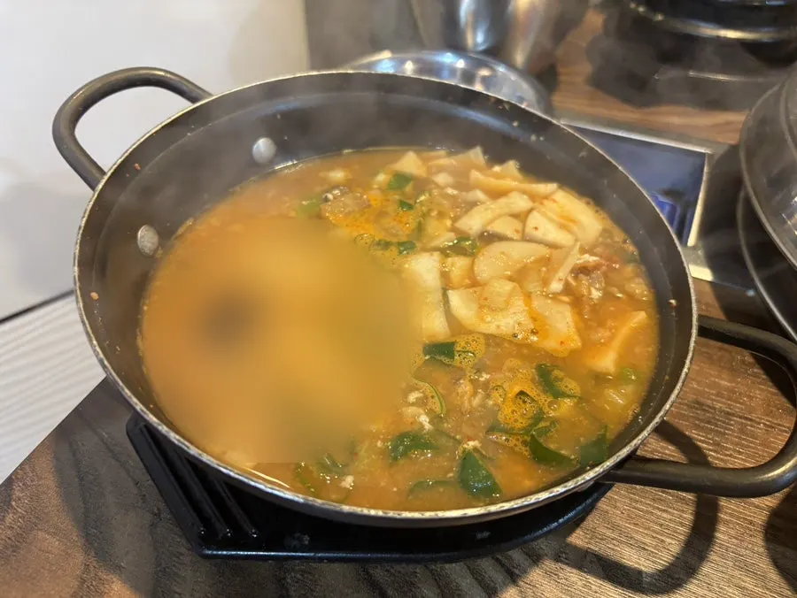 Pot of doenjang jjigae ordered to finish the meal