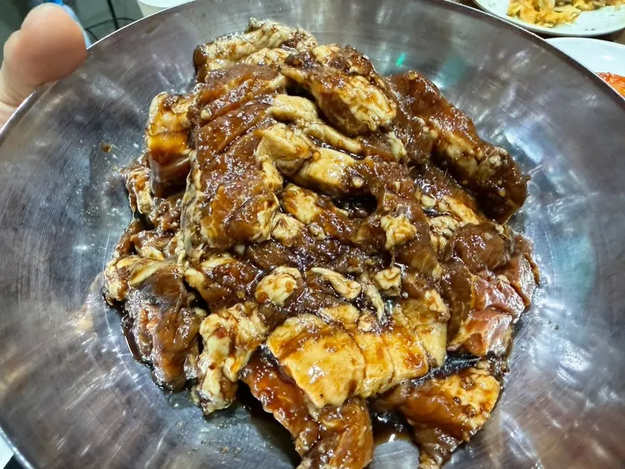 Pork belly served with aged kimchi
