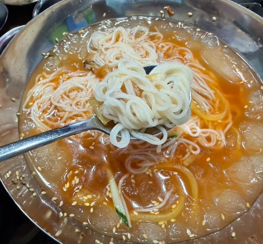 Cold kimchi noodle soup with aged kimchi