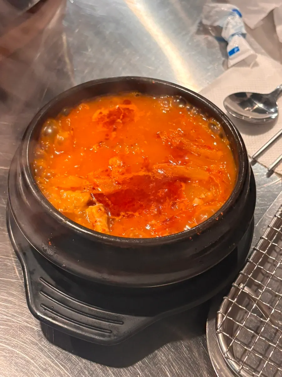Cheese egg steam puffed up in a stone pot