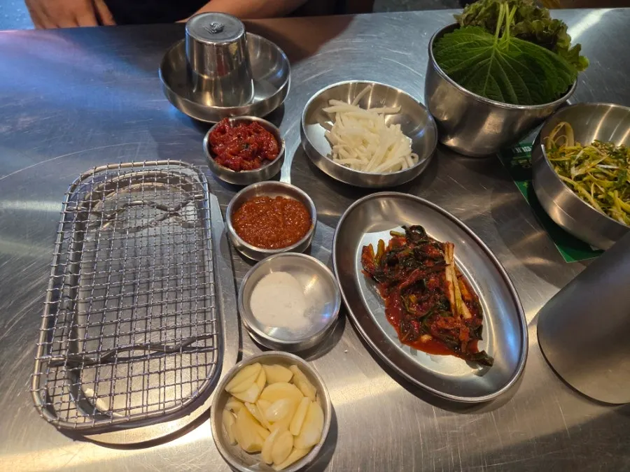 Side dishes pre-set on the table for the reservation