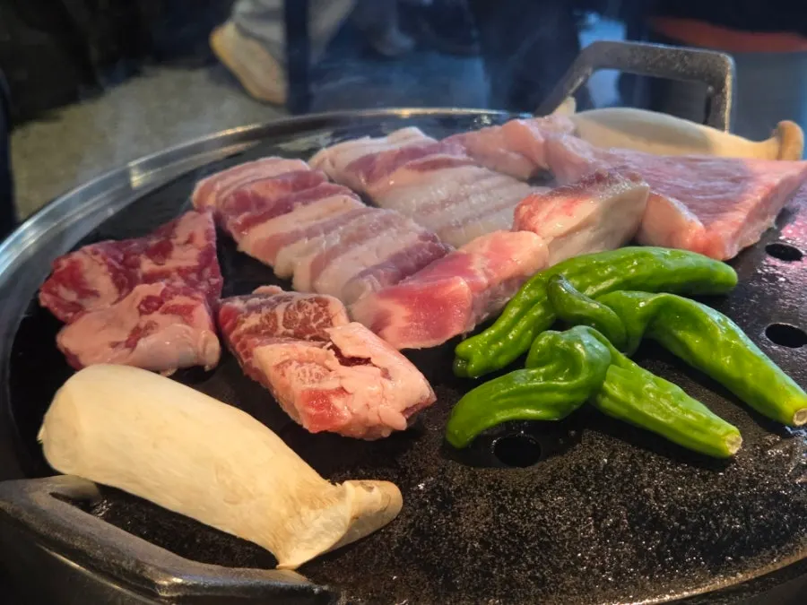 Pork grilling on the cast-iron pan