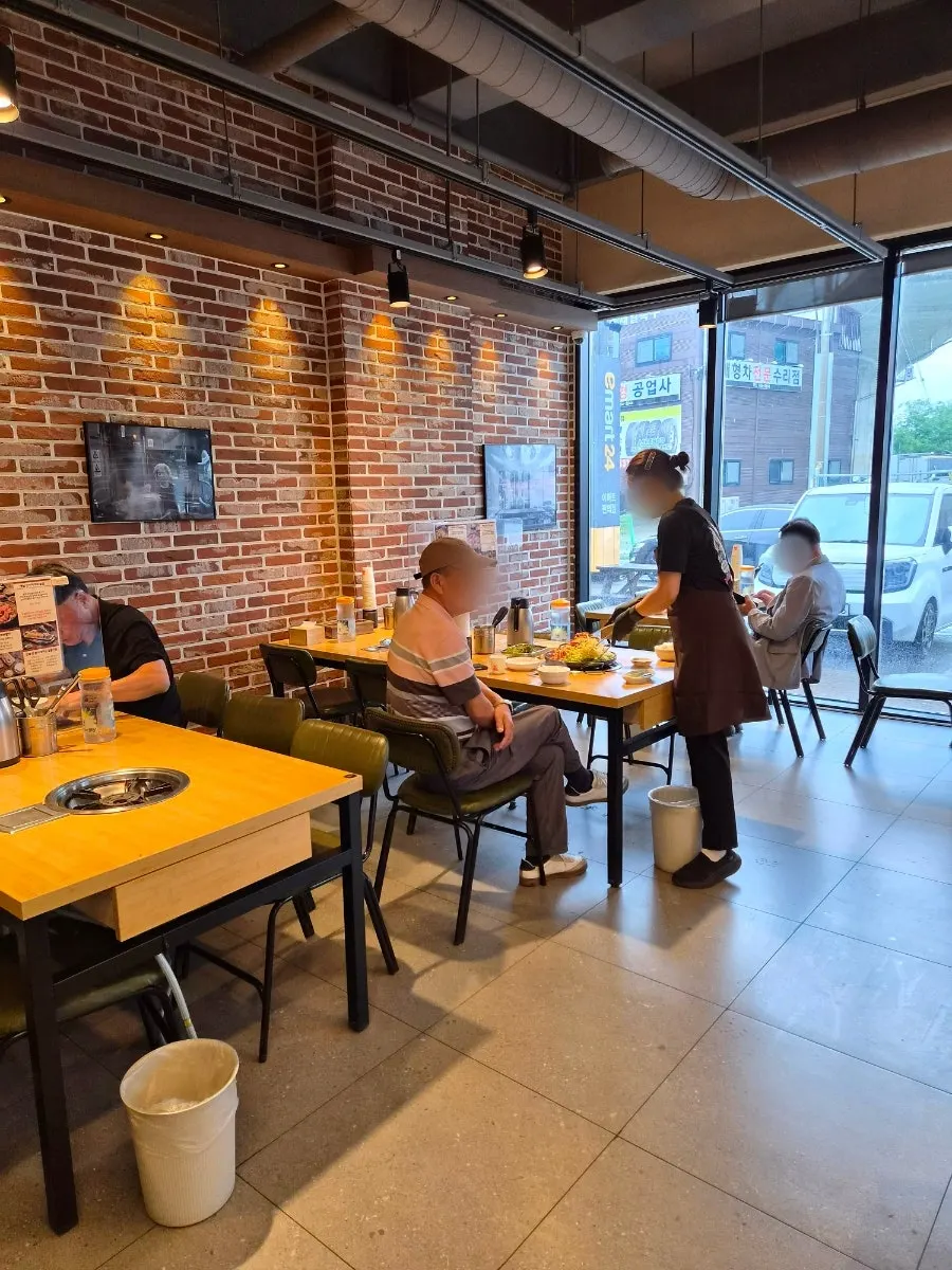 Dining hall with full window and brick interior