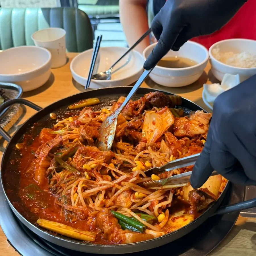 Full meal table with seaweed soup