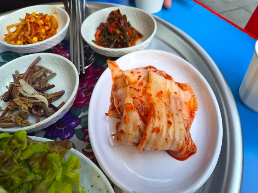 Side dishes served with the frozen pork belly