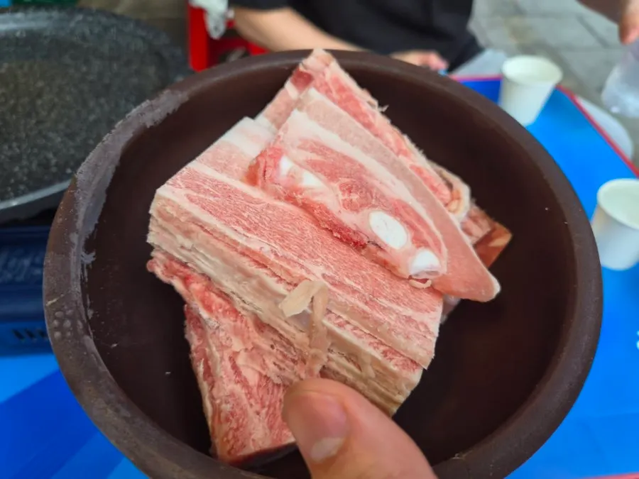 Thin pork belly turning golden brown