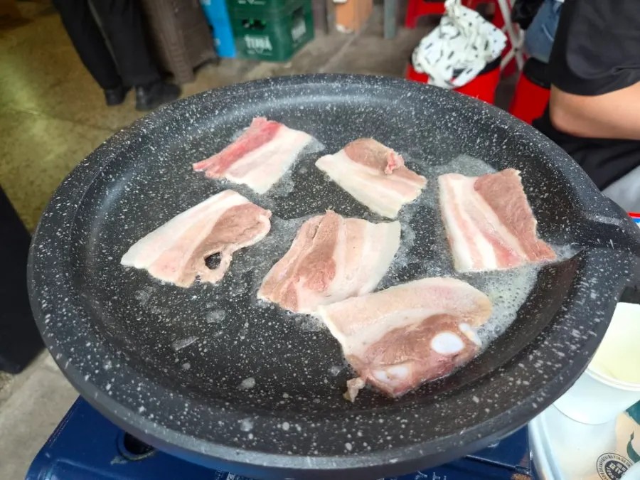 Pork belly grilled crispy along the edges