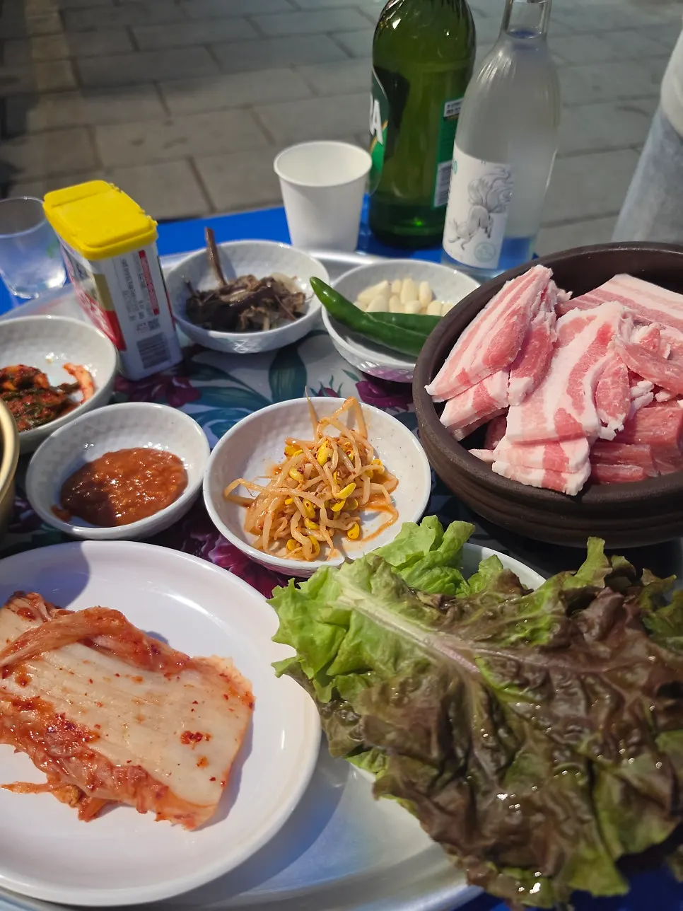 Quick-frozen pork belly cooking on the grill