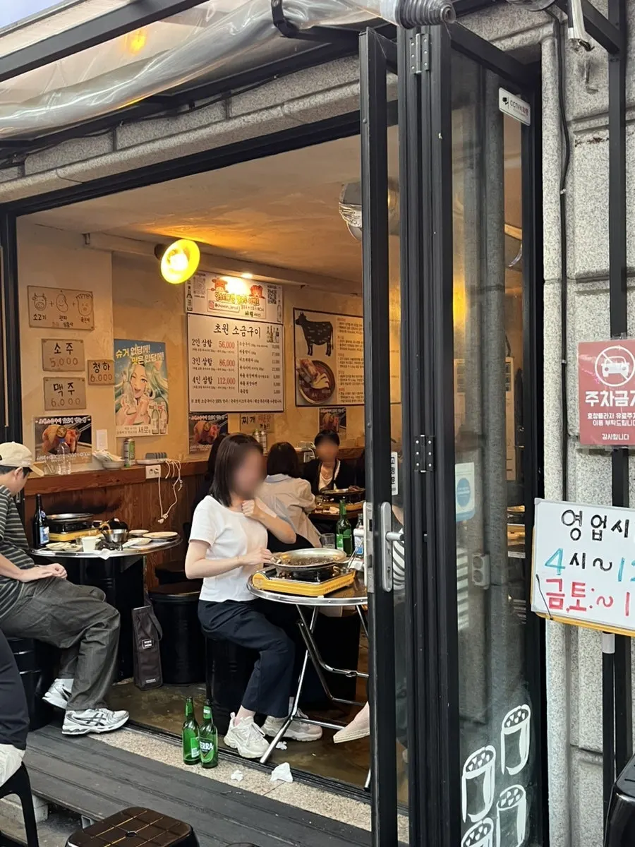 Outdoor tables filled with weekday evening customers