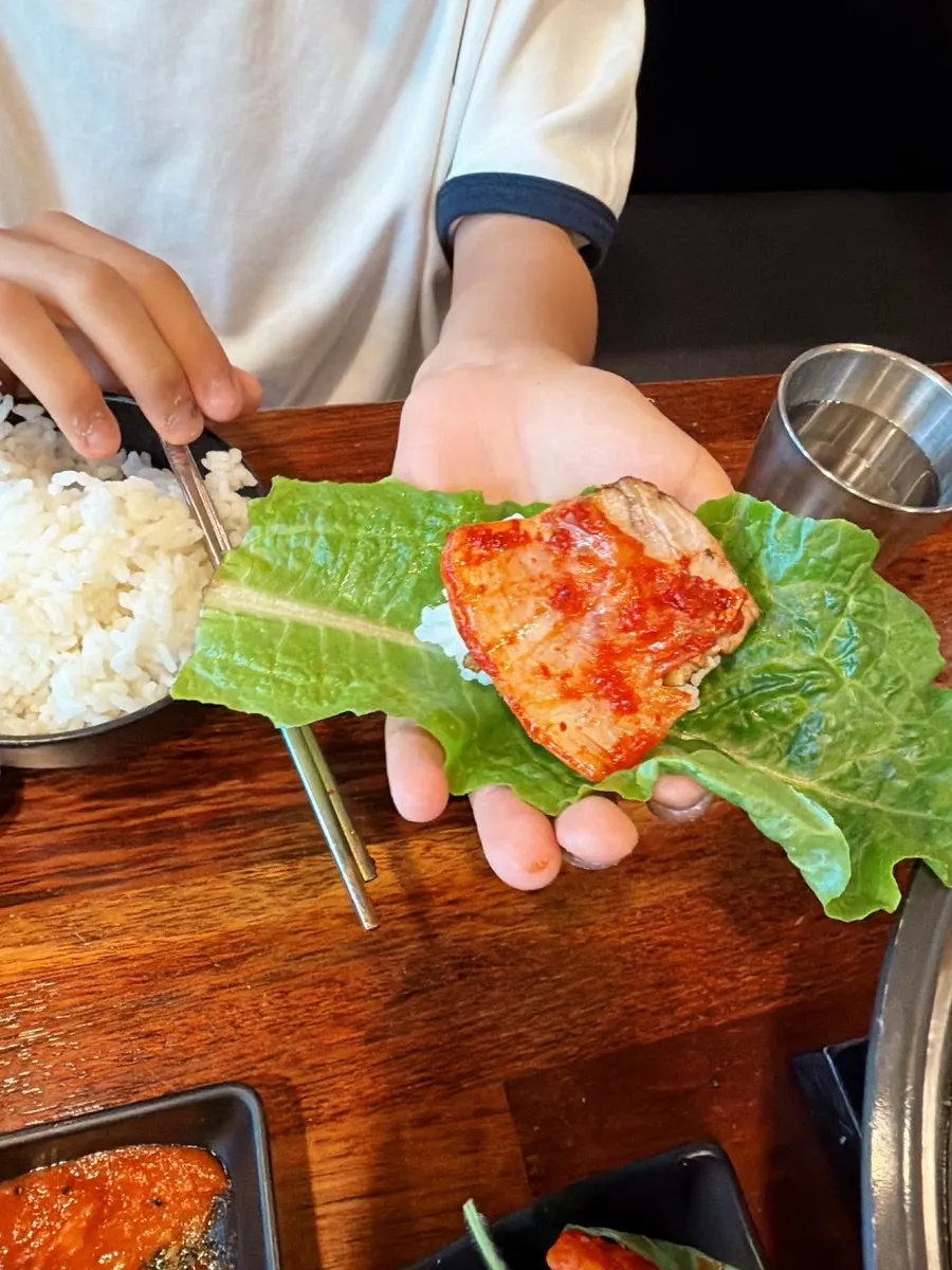 Table setting with kimchi and wrap vegetables for bossam