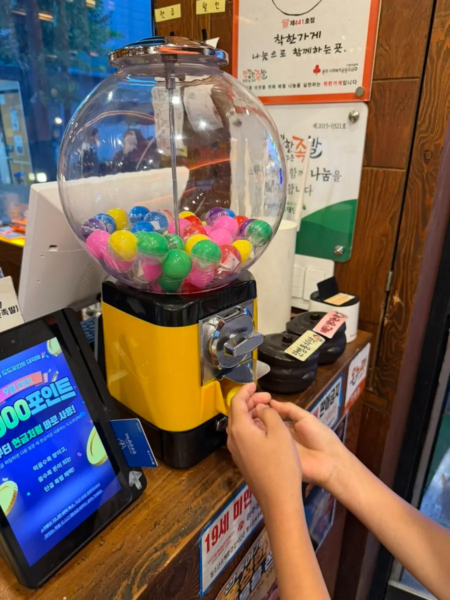 Scratch card event corner next to the checkout counter