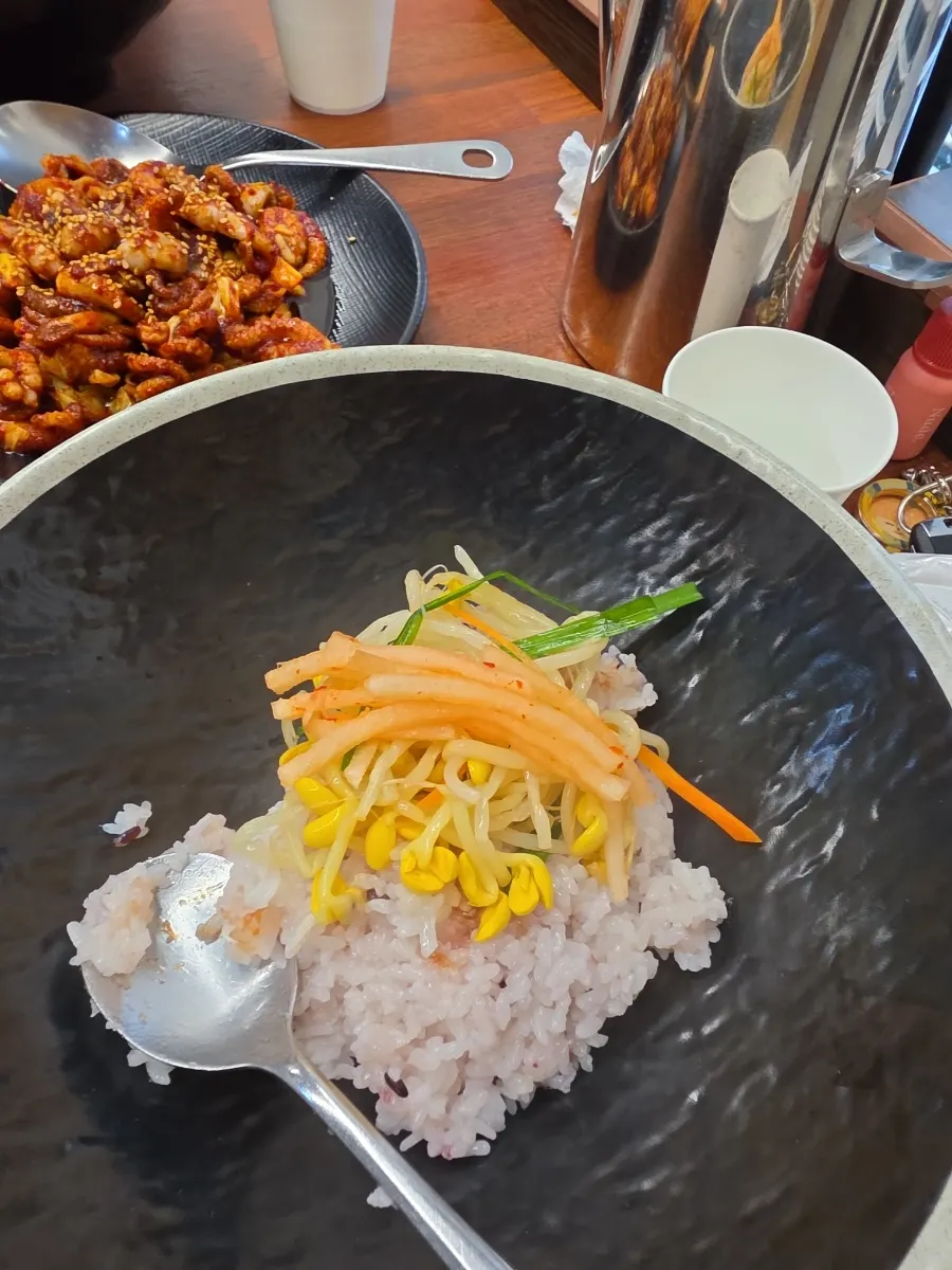 Large bowl with jjukkumi and radish salad mixed in