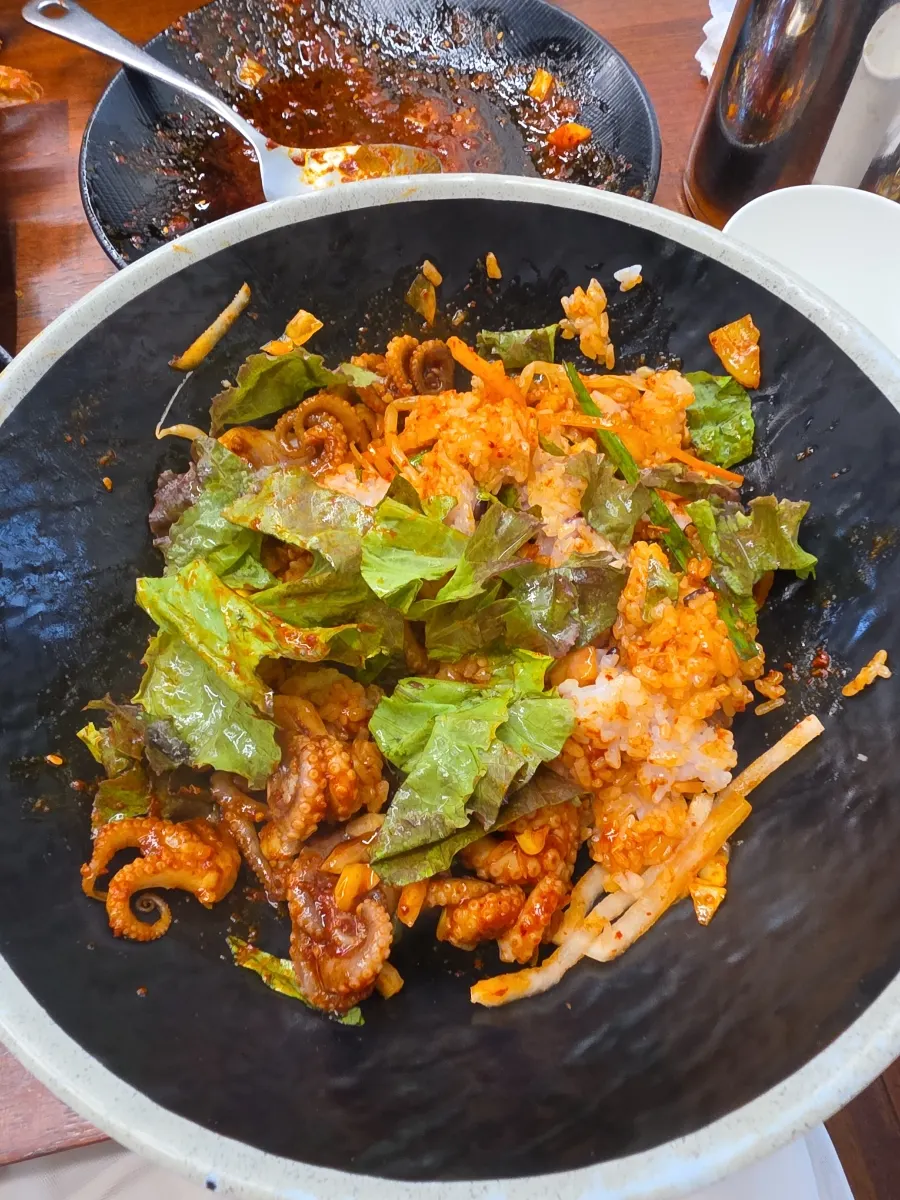 Jjukkumi bibimbap mixed with plenty of lettuce