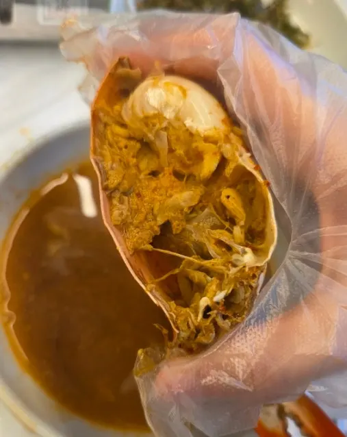 Cross-section of crab packed with meat and roe