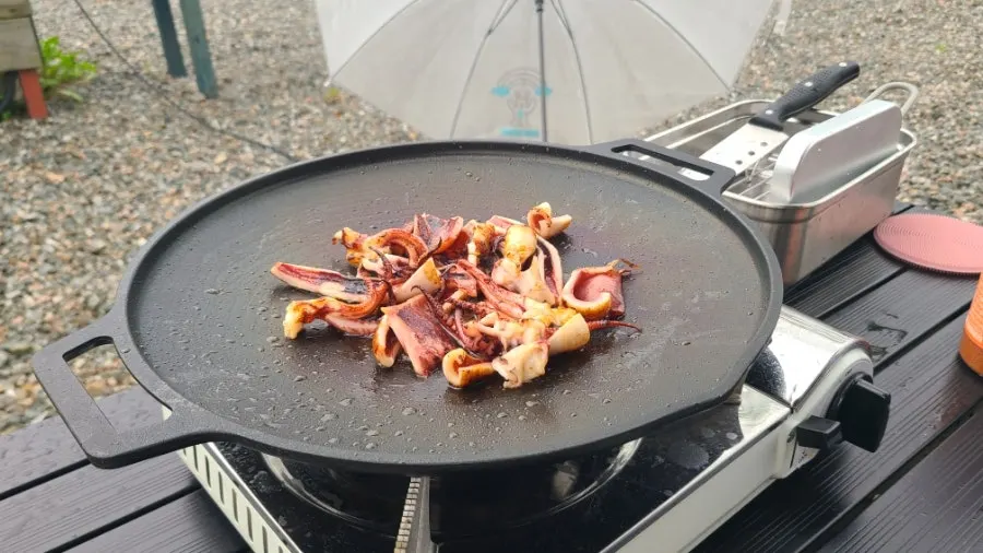 Camp cooking enjoyed by the fire