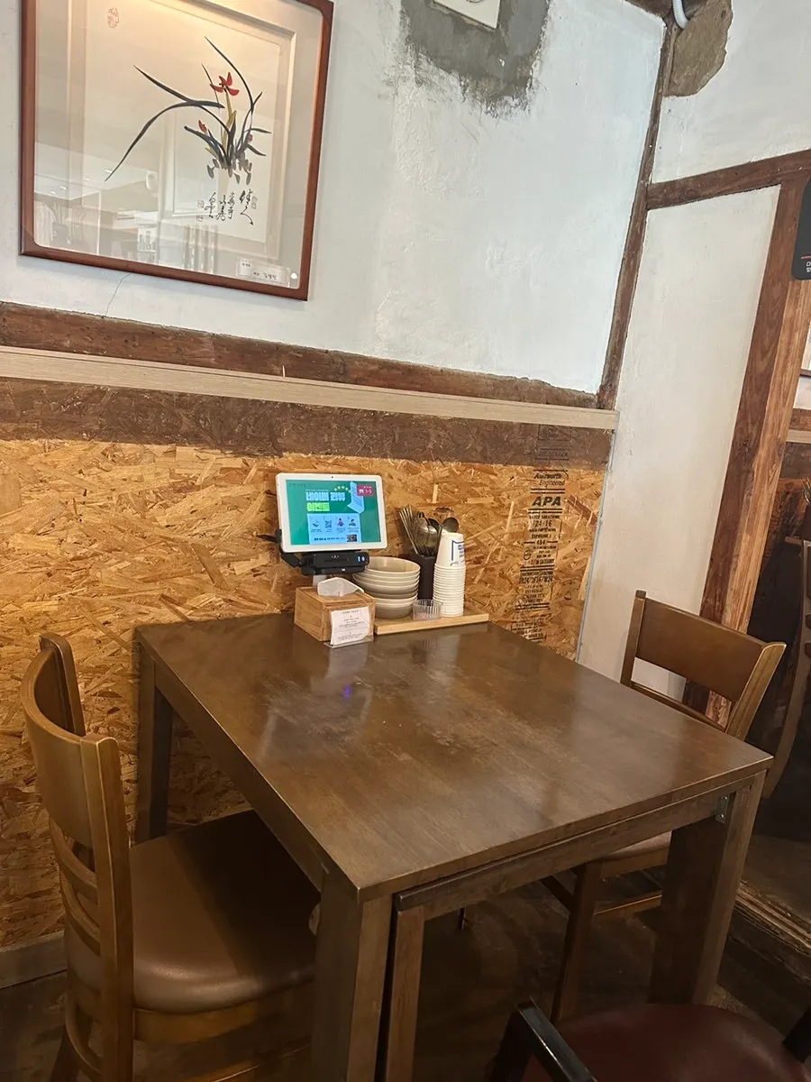 Interior of Hyeondae Memil showing the buckwheat menu focus