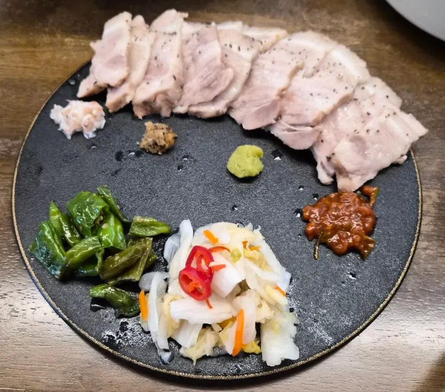 Sous vide whole pork belly enjoyed keto-style