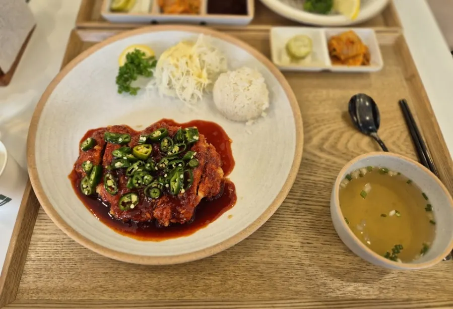 A thick piece of loin cutlet showing the meat