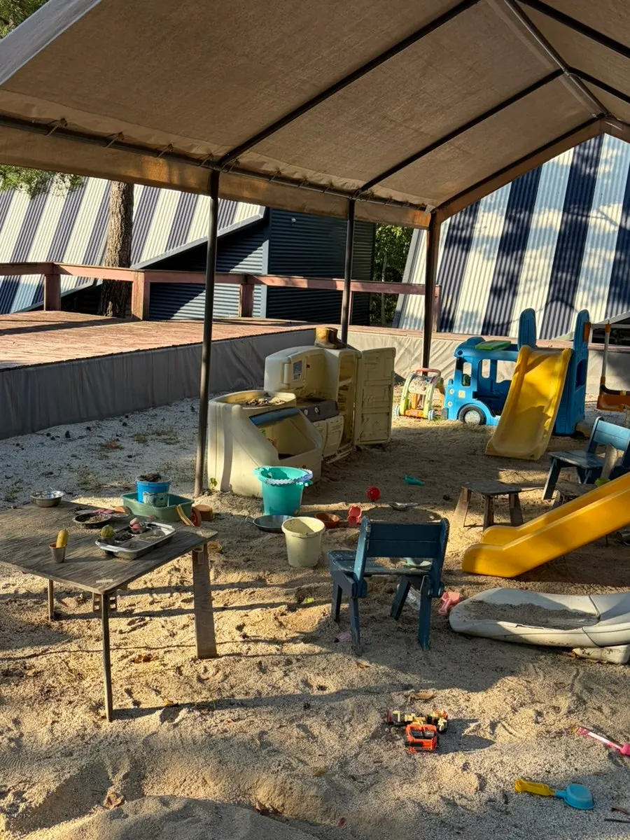 A child playing at the play facilities
