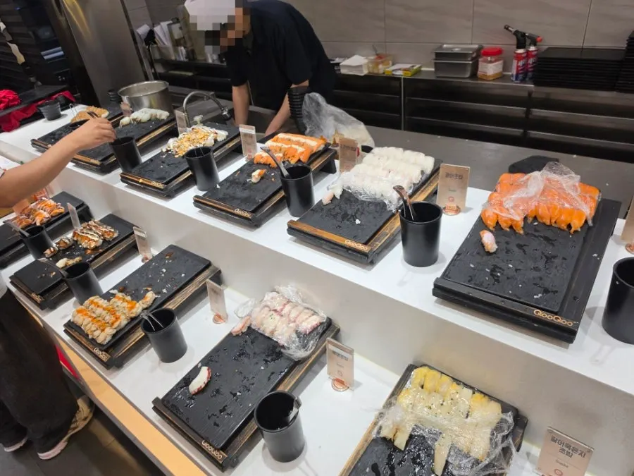 Buffet display of sashimi and seafood