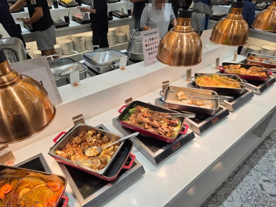 Korean food corner with gomtang and pumpkin porridge