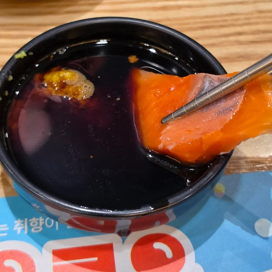 Smoked salmon sashimi with soy sauce