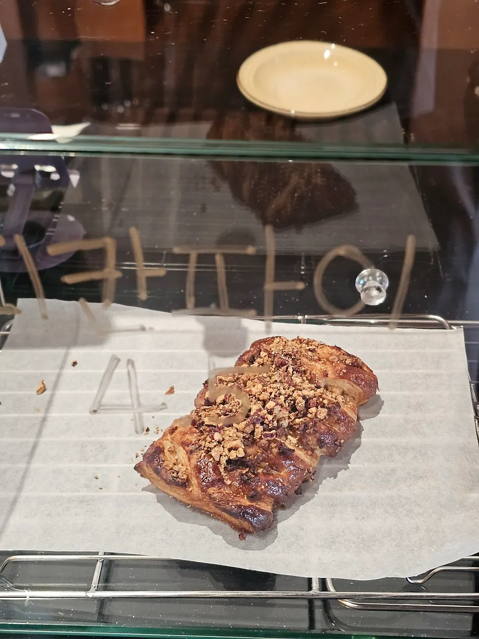 Dessert case with a sold-out sign
