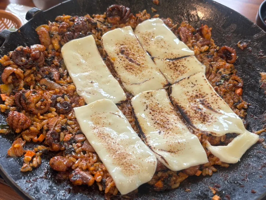 Fried rice ingredients before frying on the hot plate