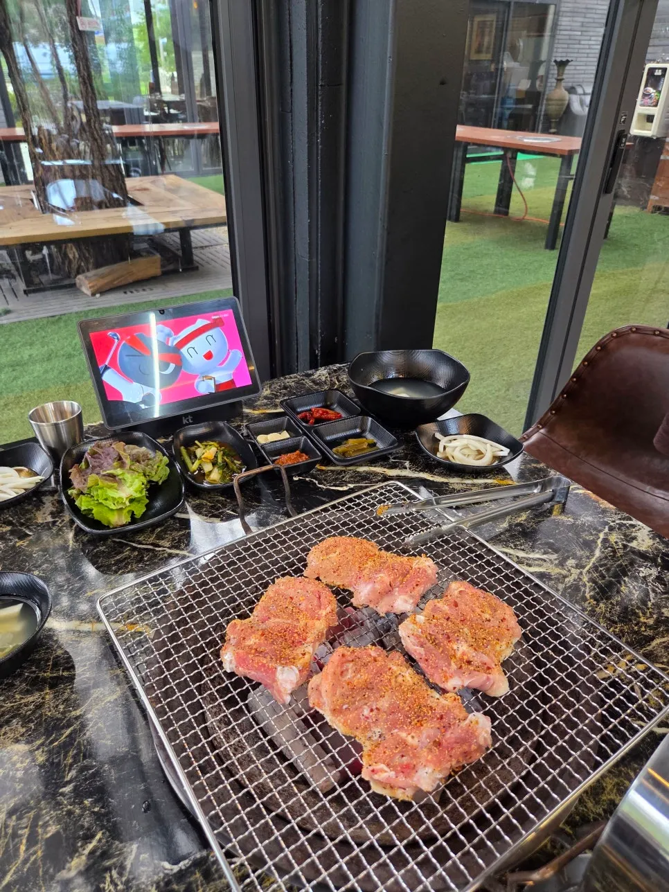 Large raw chicken thigh meat with salt marinade