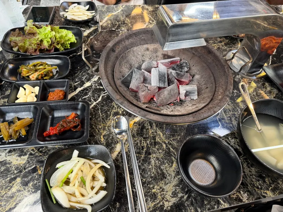 Table set with a charcoal grill