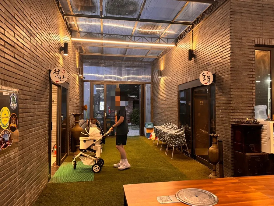 Entrance split into griddle zone and charcoal zone